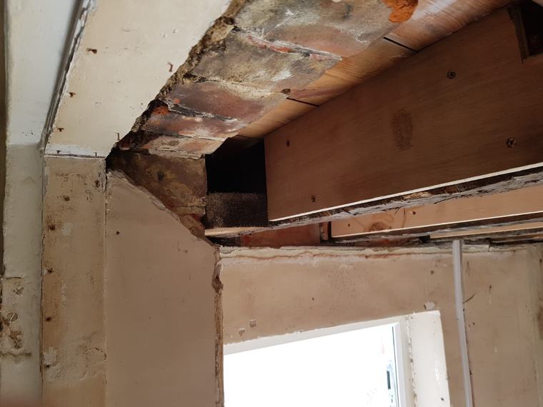 Close-up of exposed ceiling structure during refurbishment