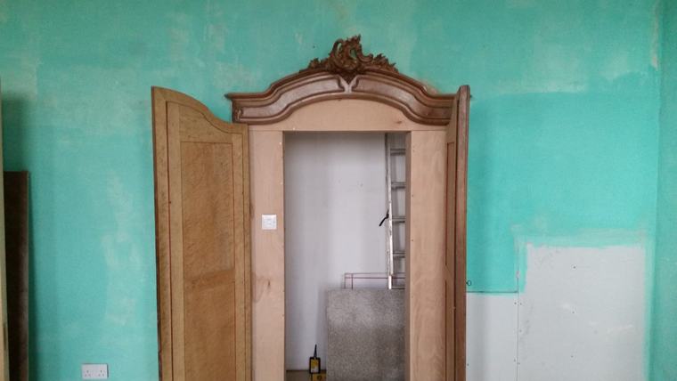 Period doorway and room being prepared for restoration